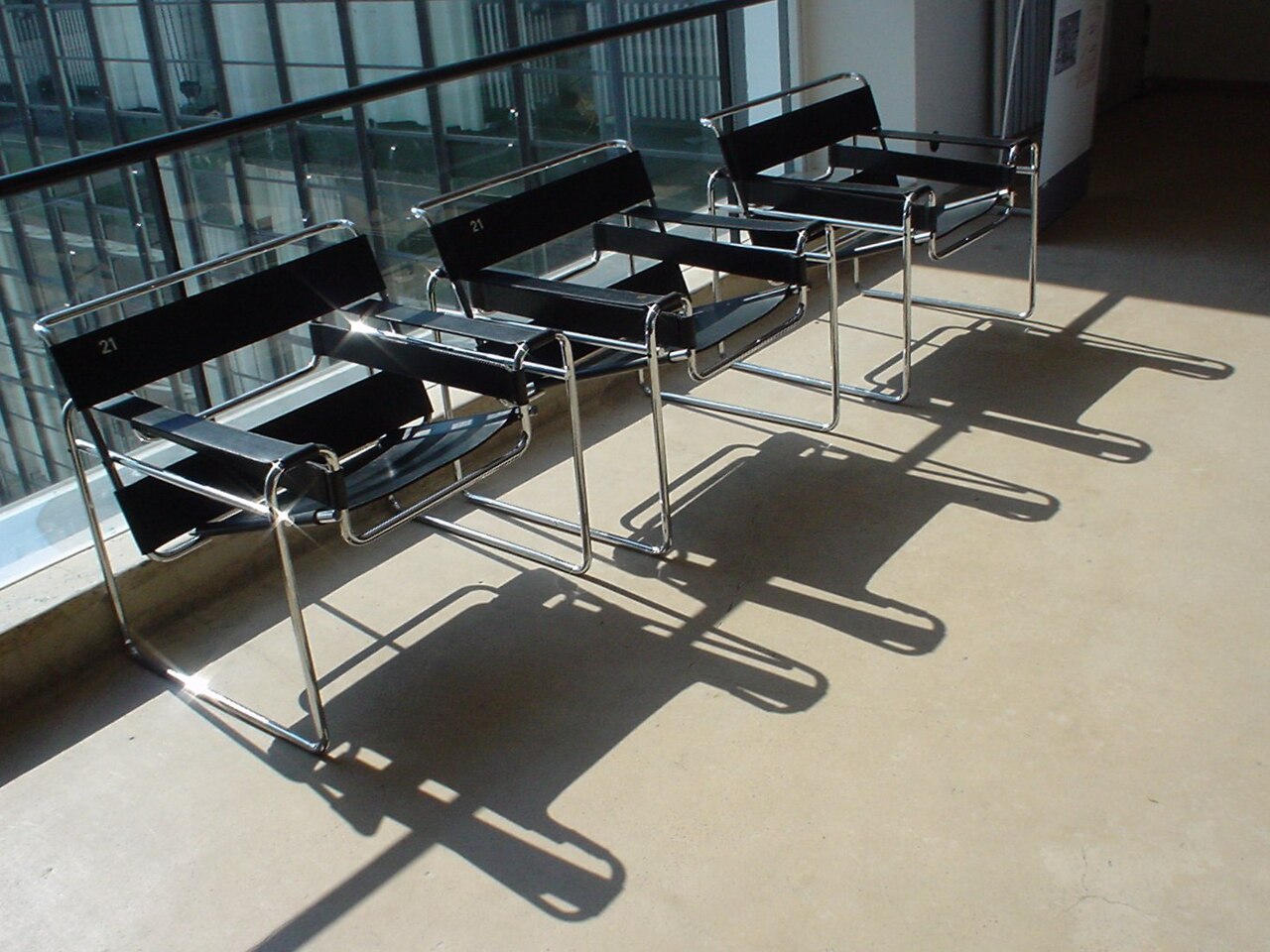 Marcel Breuer’s Wassily Chair (1925) epitomized the Bauhaus mission to fuse art and applied craft, using modern industrial materials like tubular steel to revolutionize furniture design.